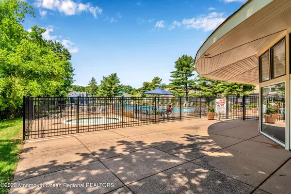 a childrens park with lots of swings and slides