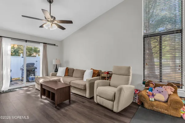 a living room with furniture and window