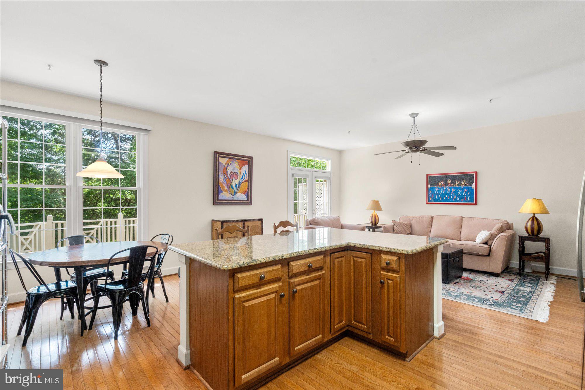 8510 Bells Ridge Terrace Potomac, MD 20854 - Photo 13 of 42 a view of a dining room with furniture window and wooden floor