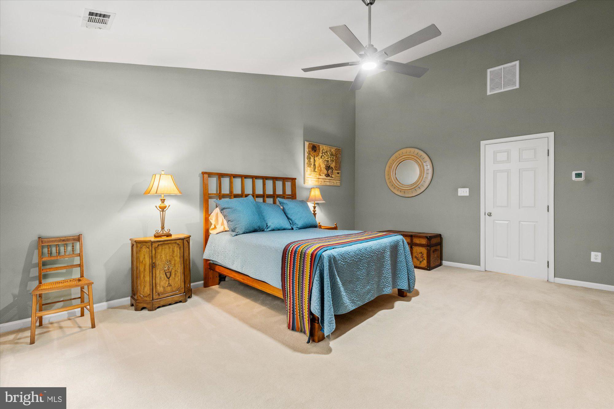 8510 Bells Ridge Terrace Potomac, MD 20854 - Photo 17 of 42 a bedroom with a bed and window