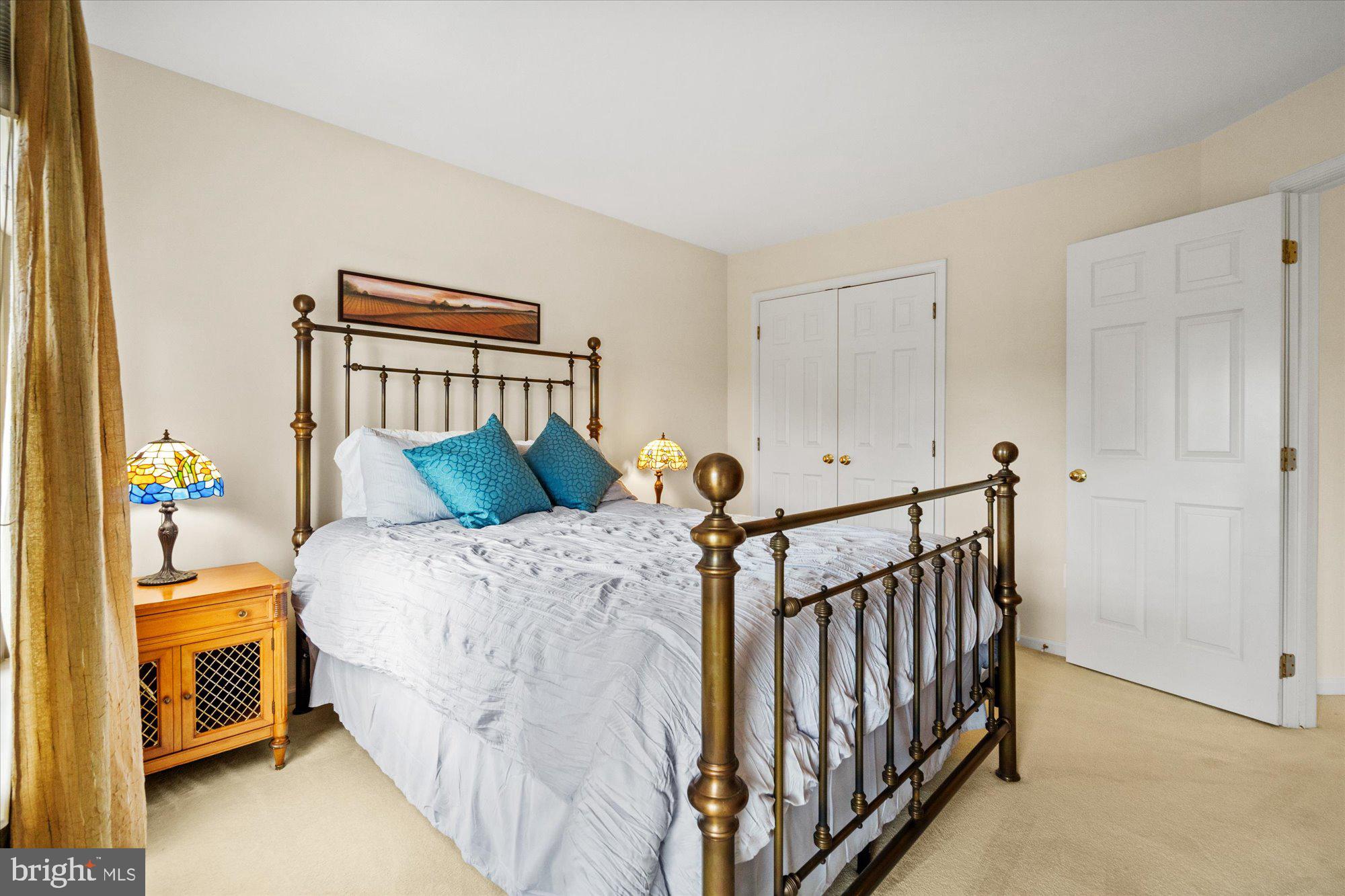 8510 Bells Ridge Terrace Potomac, MD 20854 - Photo 22 of 42 a bedroom with bed and a window