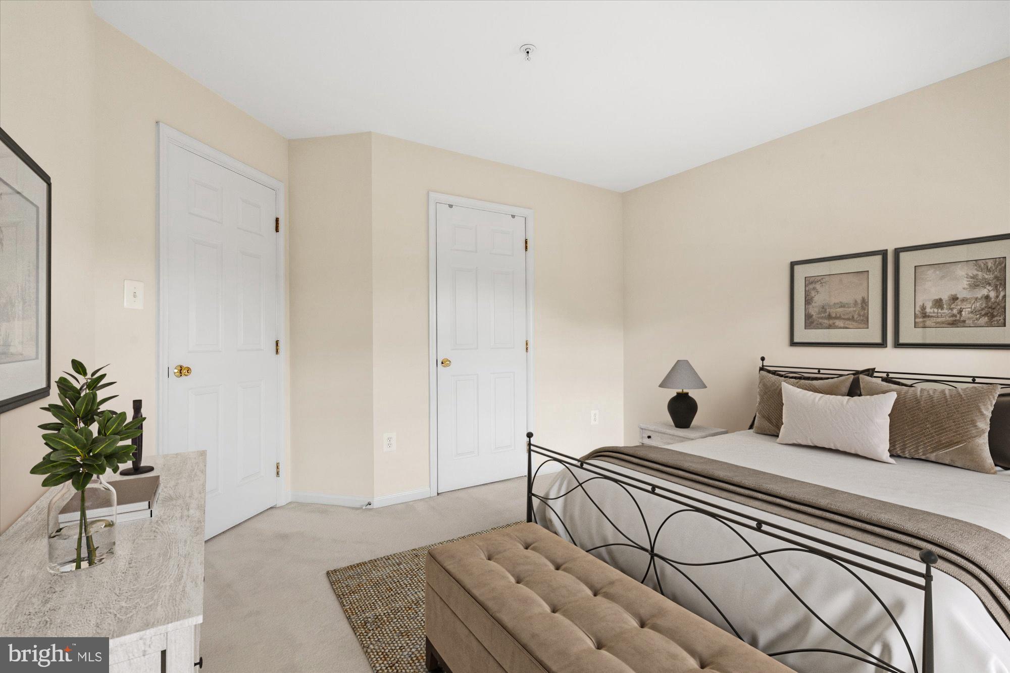 8510 Bells Ridge Terrace Potomac, MD 20854 - Photo 24 of 42 a bedroom with a bed and a table