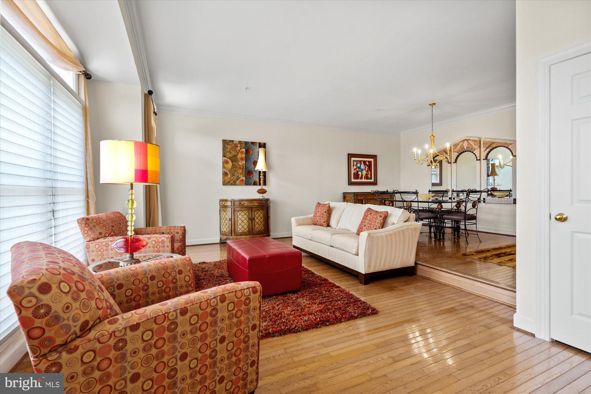 8510 Bells Ridge Terrace Potomac, MD 20854 - Photo 3 of 42 a living room with furniture and a fireplace