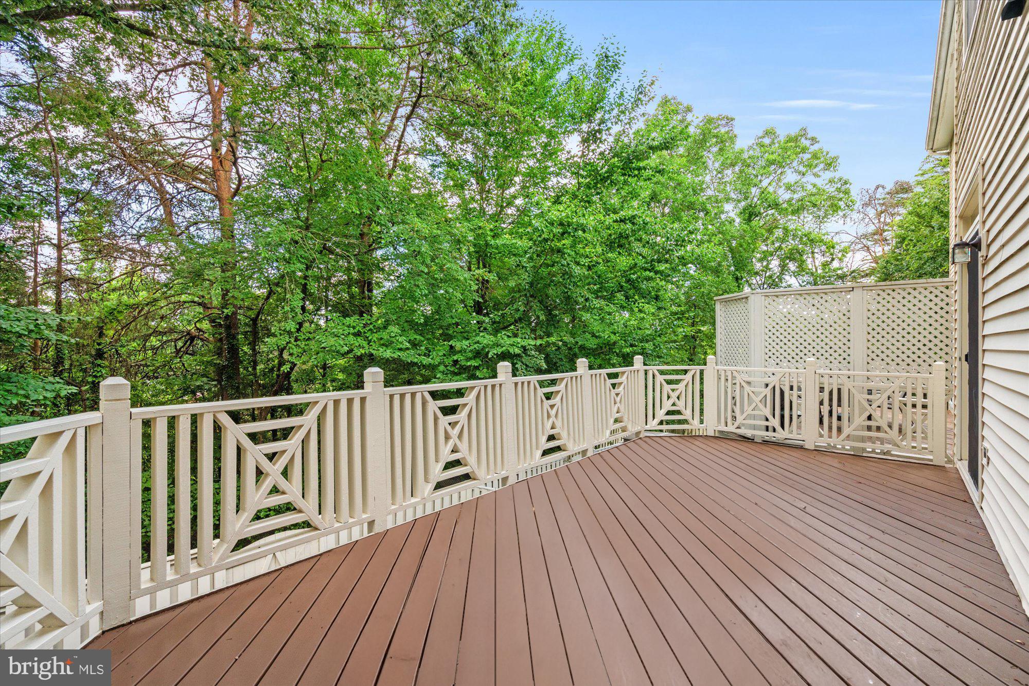 8510 Bells Ridge Terrace Potomac, MD 20854 - Photo 31 of 42 a view of deck with wooden floor and fence