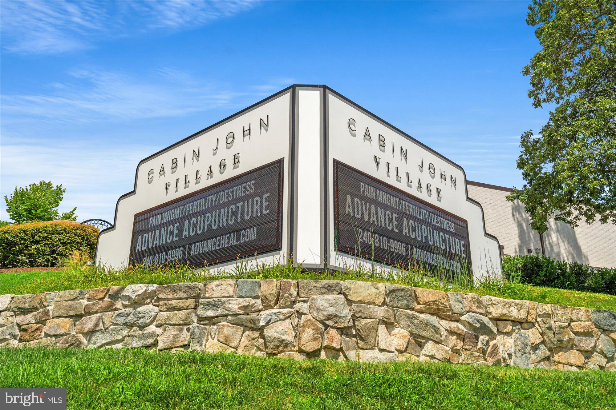 8510 Bells Ridge Terrace Potomac, MD 20854 - Photo 38 of 42 a sign on the side of a building