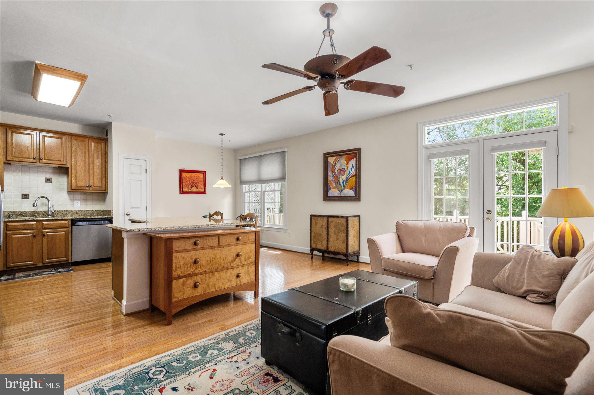 8510 Bells Ridge Terrace Potomac, MD 20854 - Photo 8 of 42 a living room with furniture flat screen tv and window