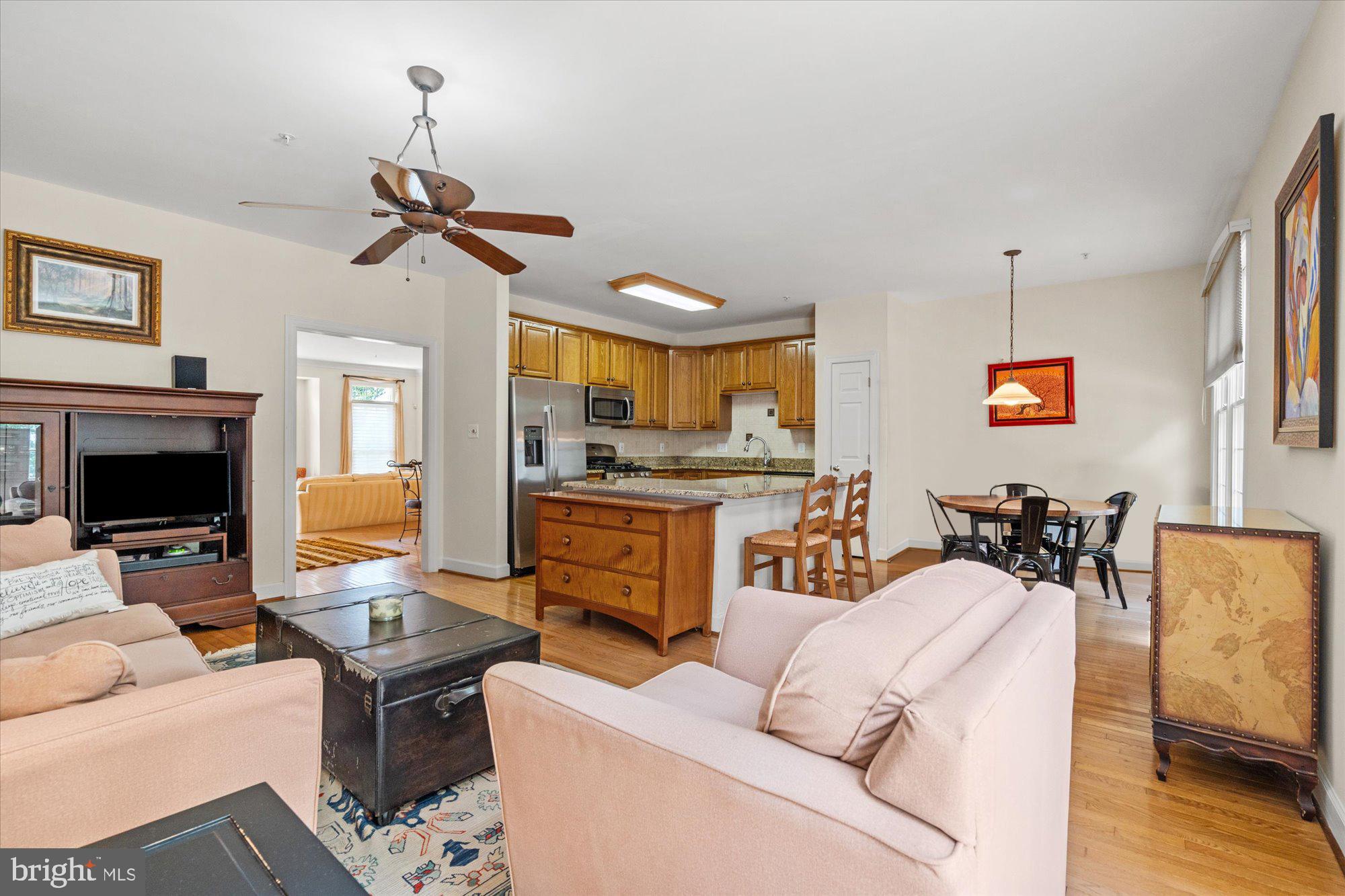 8510 Bells Ridge Terrace Potomac, MD 20854 - Photo 9 of 42 a living room with furniture and a fireplace