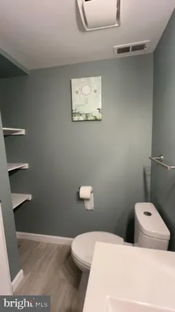 a bathroom with a toilet