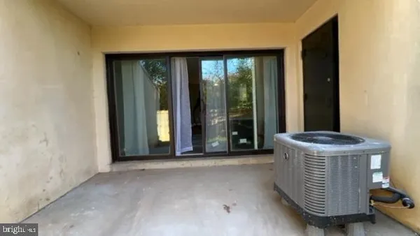 a view of a hallway with windows