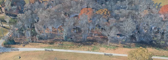 a view of a wooden fence of a house