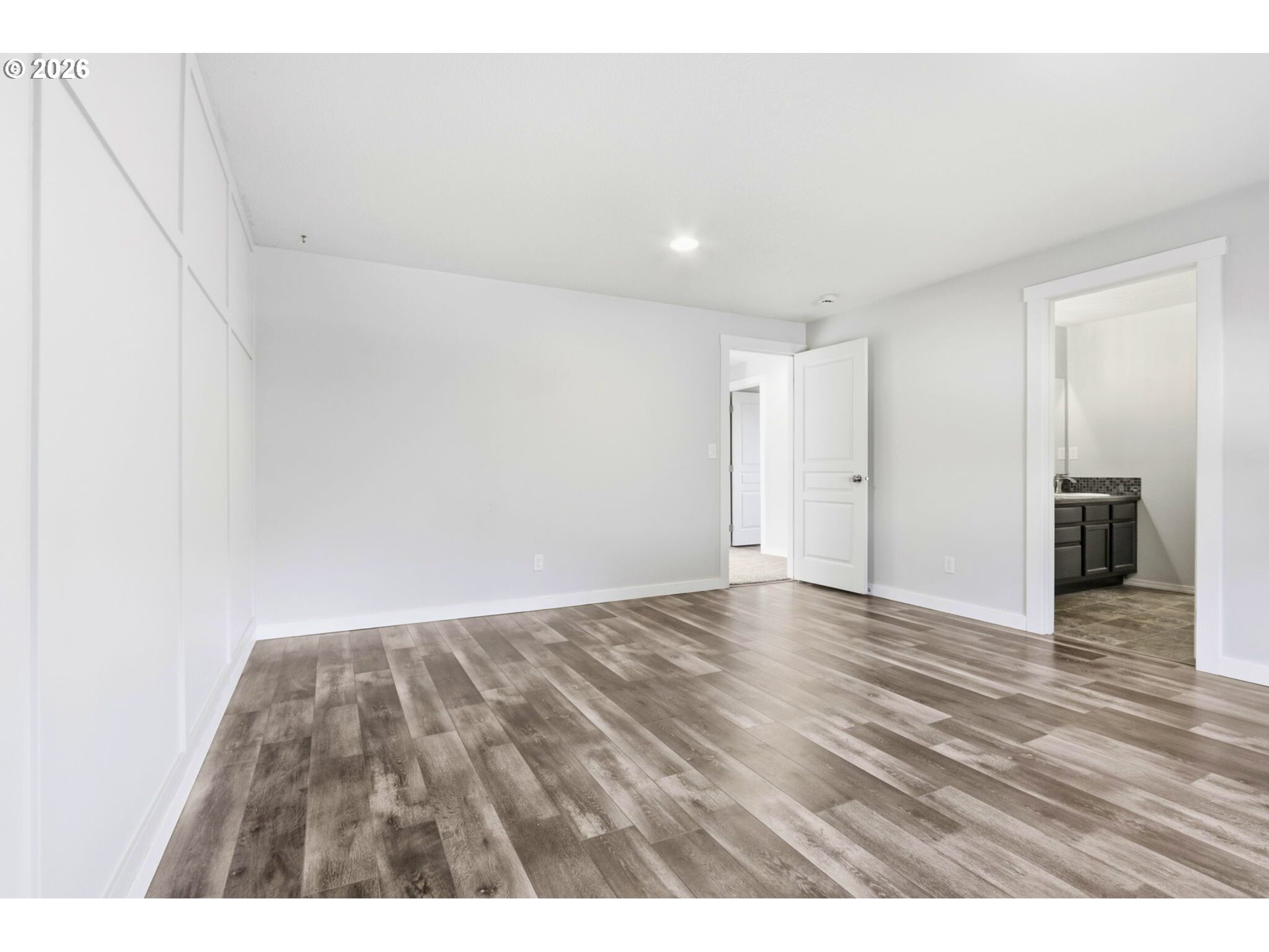 36713 Indian Summer Street Sandy, OR 97055 - Photo 13 of 33 a view of an empty room with wooden floor