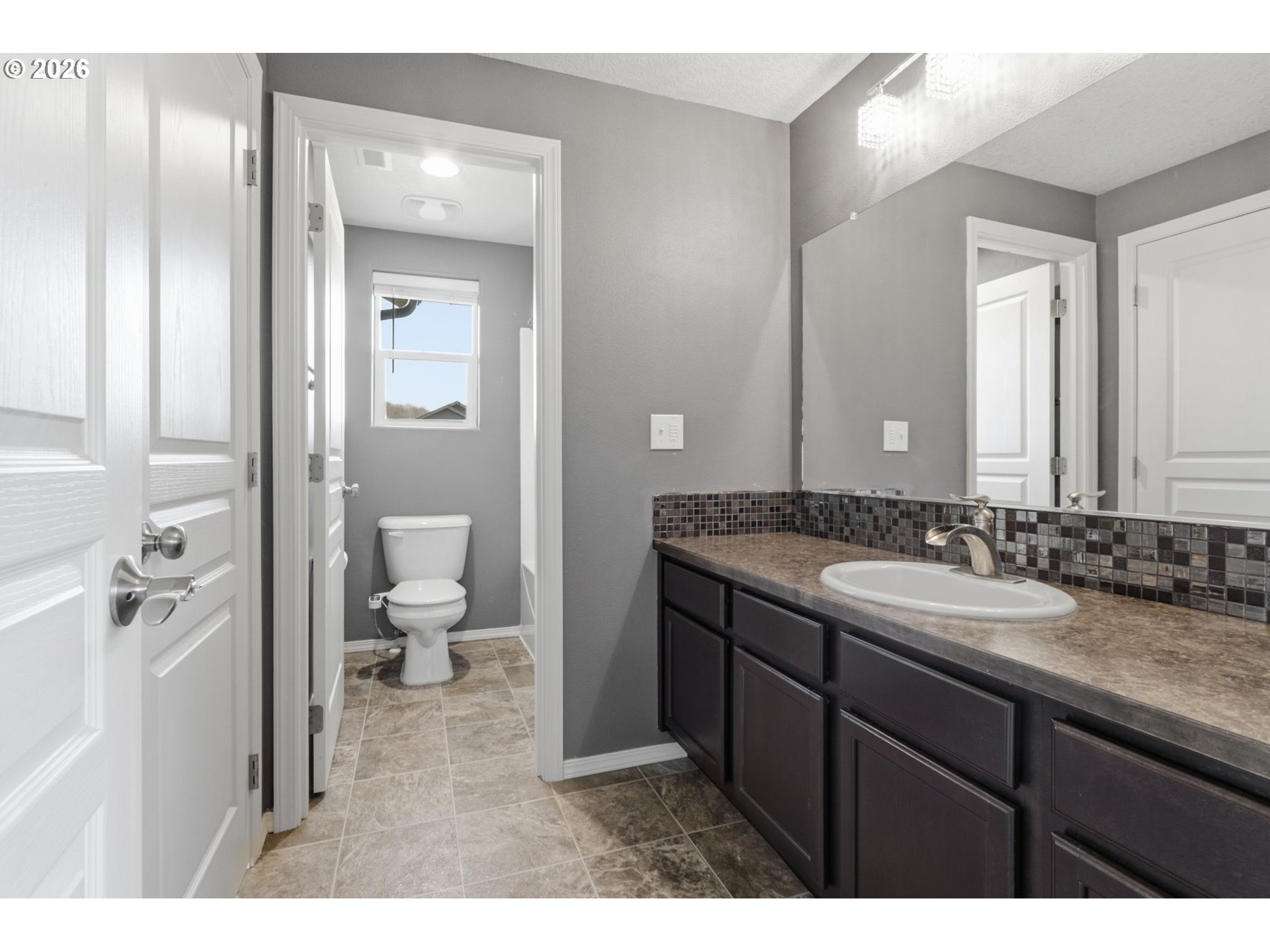 36713 Indian Summer Street Sandy, OR 97055 - Photo 18 of 33 a bathroom with a granite countertop sink toilet and shower