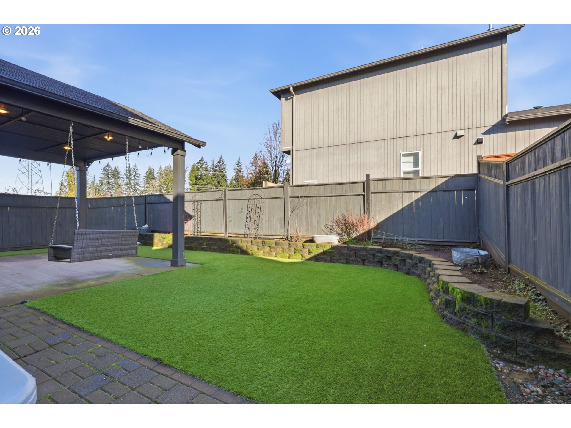 36713 Indian Summer Street Sandy, OR 97055 - Photo 27 of 33 a view of backyard with swimming pool and seating