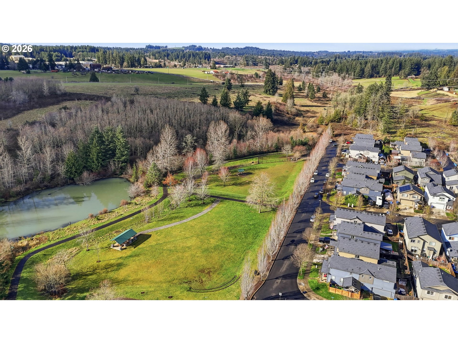 36713 Indian Summer Street Sandy, OR 97055 - Photo 32 of 33 a view of a lake in middle of the town