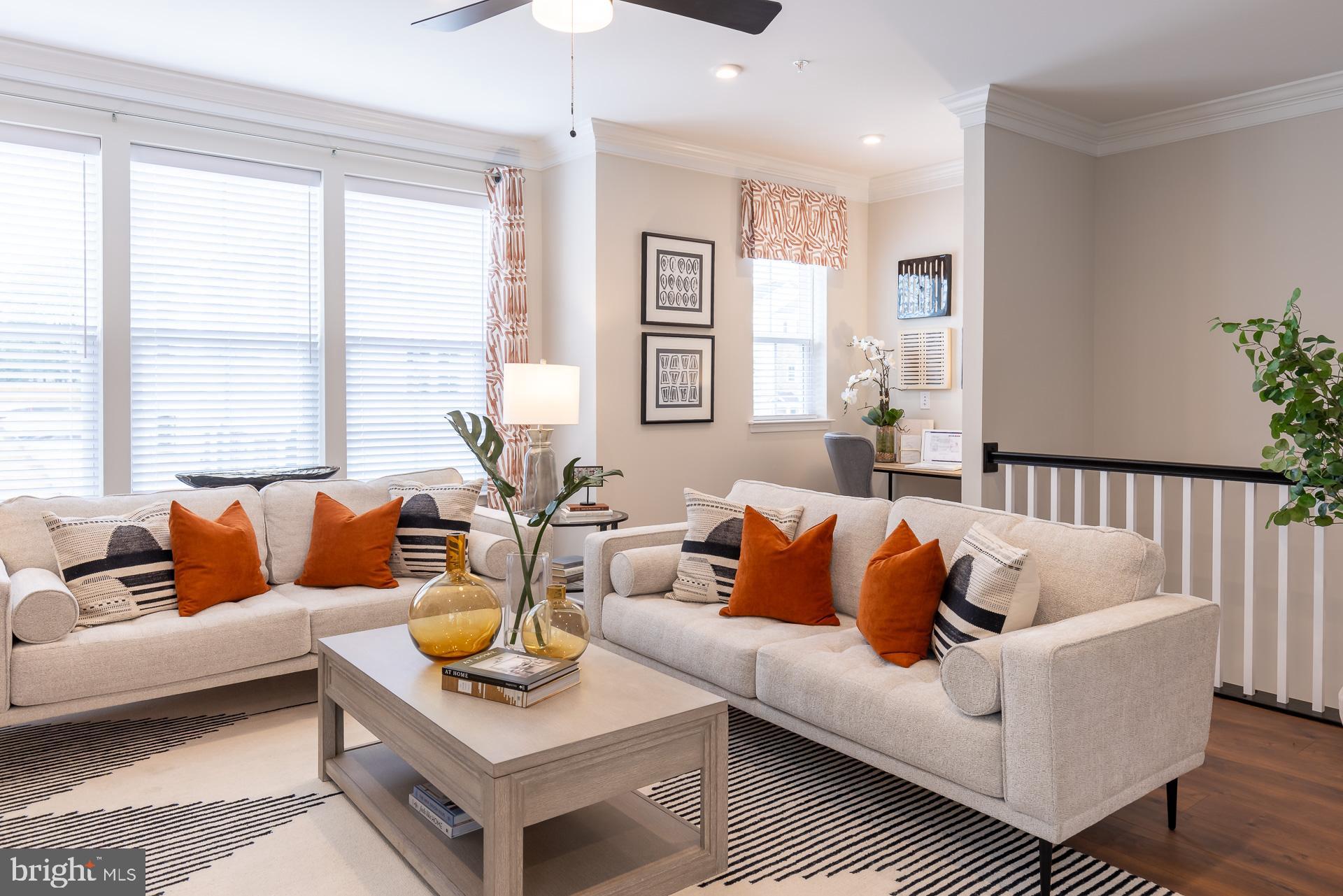 8270 Longford Road Glen Burnie, MD 21061 - Photo 5 of 11 a living room with furniture and a window