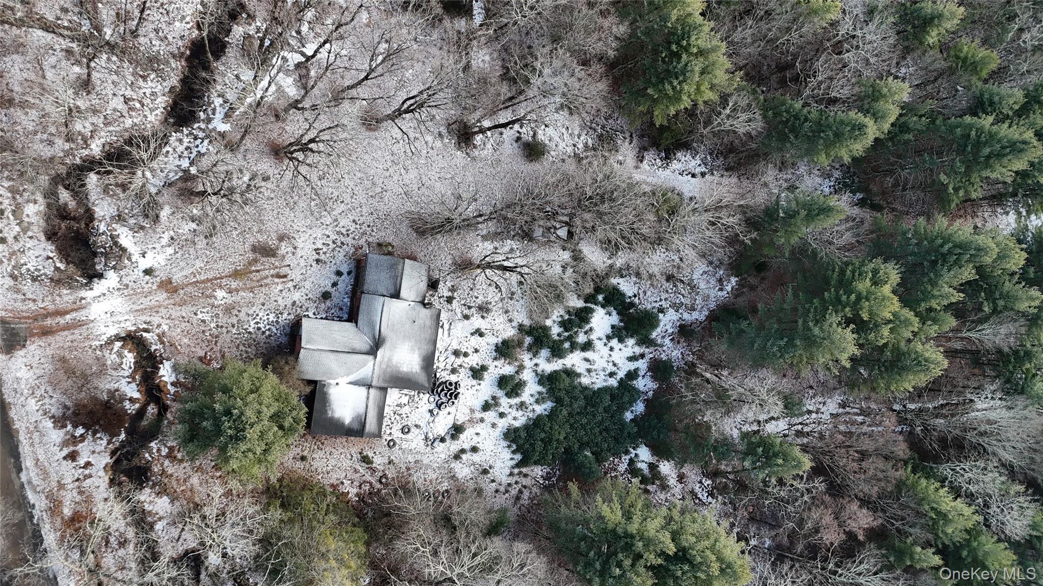 95 Skinner Road Wurtsboro, NY 12790 - Photo 20 of 49 a view of a backyard of a house with a fountain