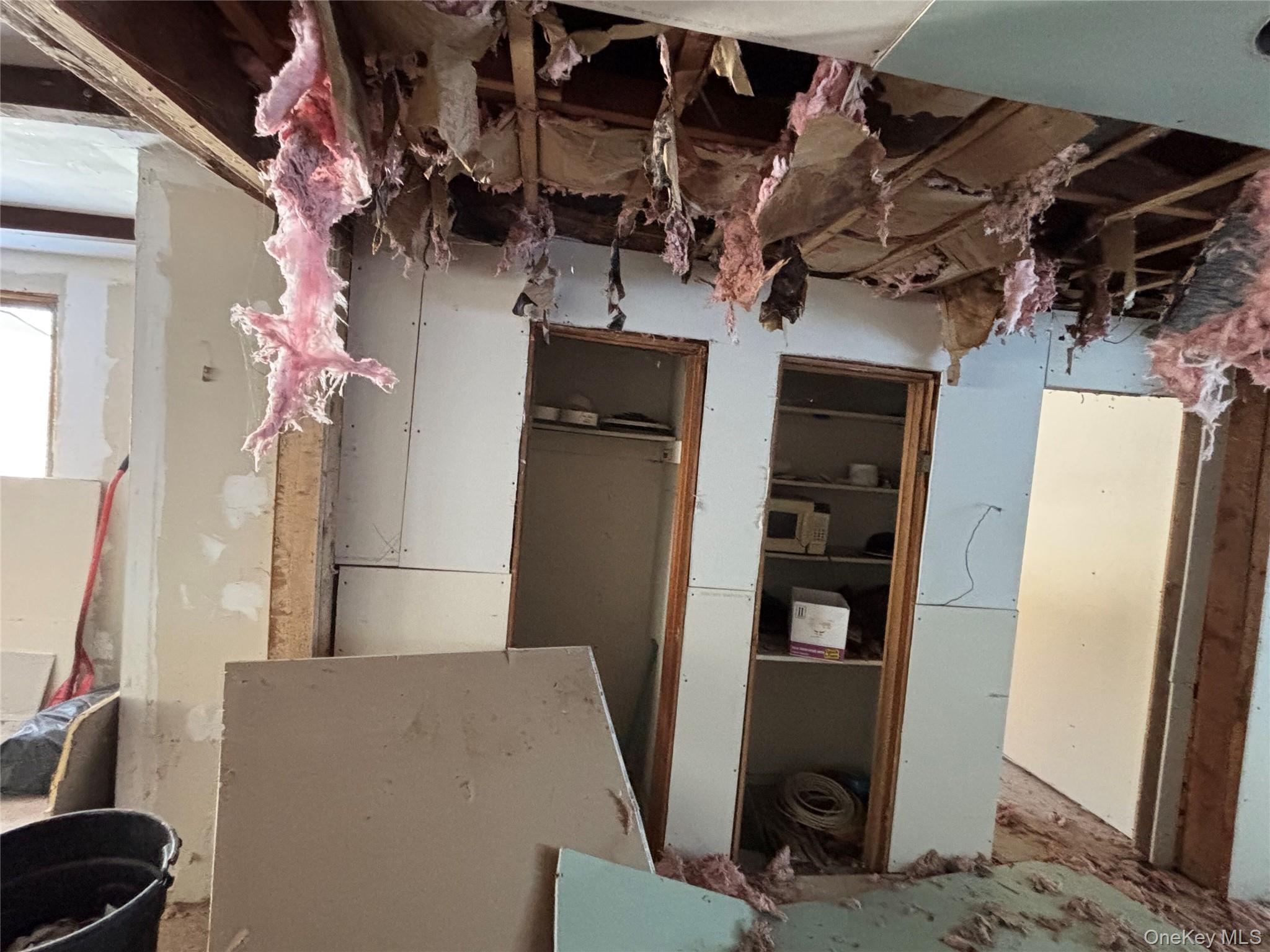 95 Skinner Road Wurtsboro, NY 12790 - Photo 32 of 49 a view of storage and utility room with refrigerator and washer