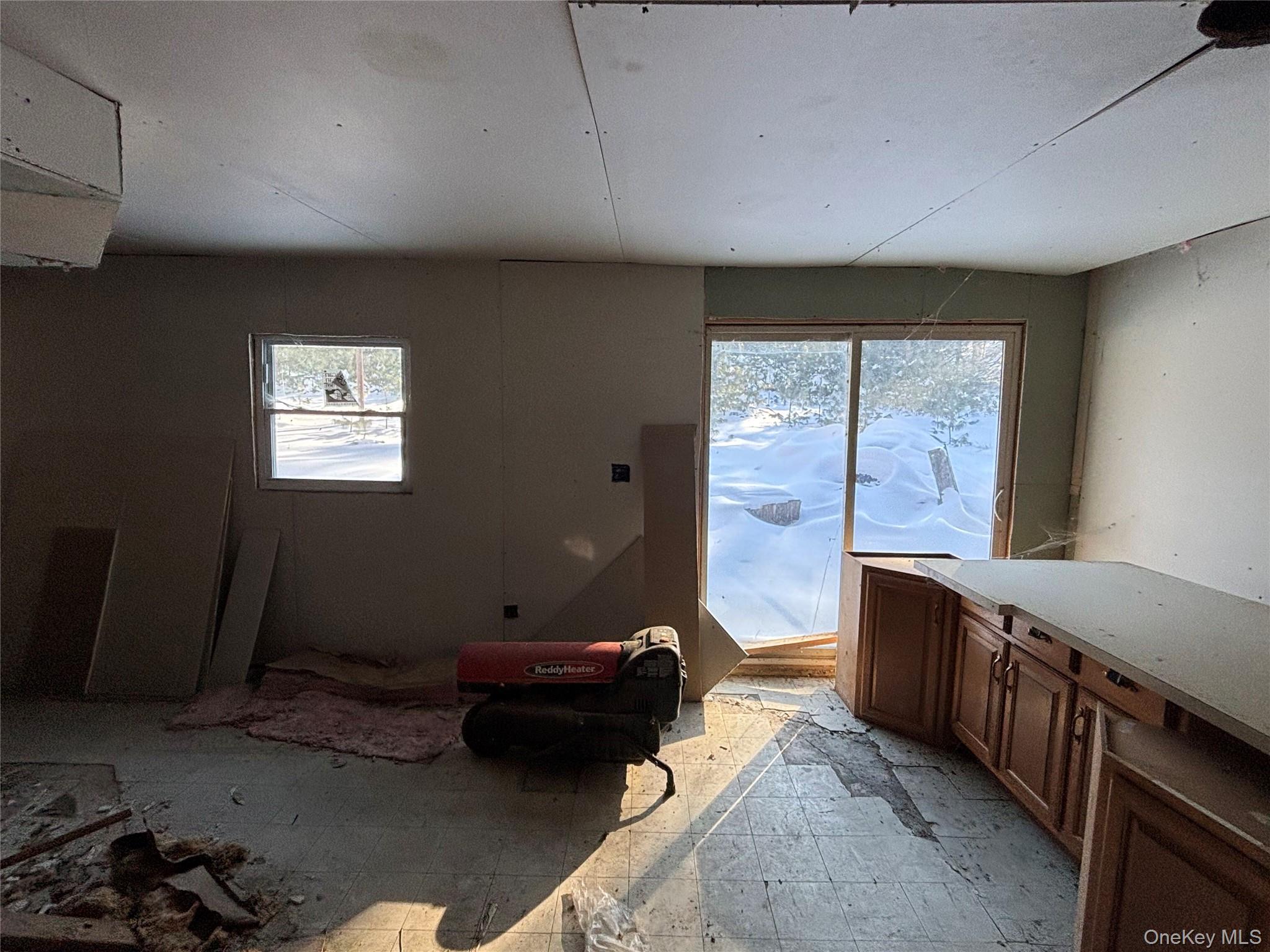 95 Skinner Road Wurtsboro, NY 12790 - Photo 44 of 49 a living room with furniture and a large window