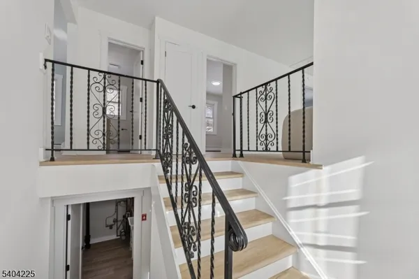 a view of entryway with wooden floor