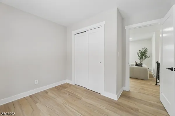 a bath room with a bath tub and a shower