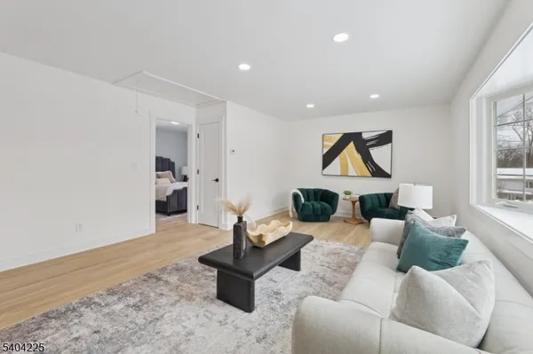 a living room with furniture and a gate