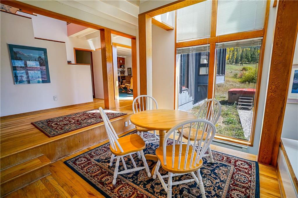 63 Saxifrage Road Keystone, CO 80435 - Photo 13 of 25 a view of a dining room with furniture next to a window