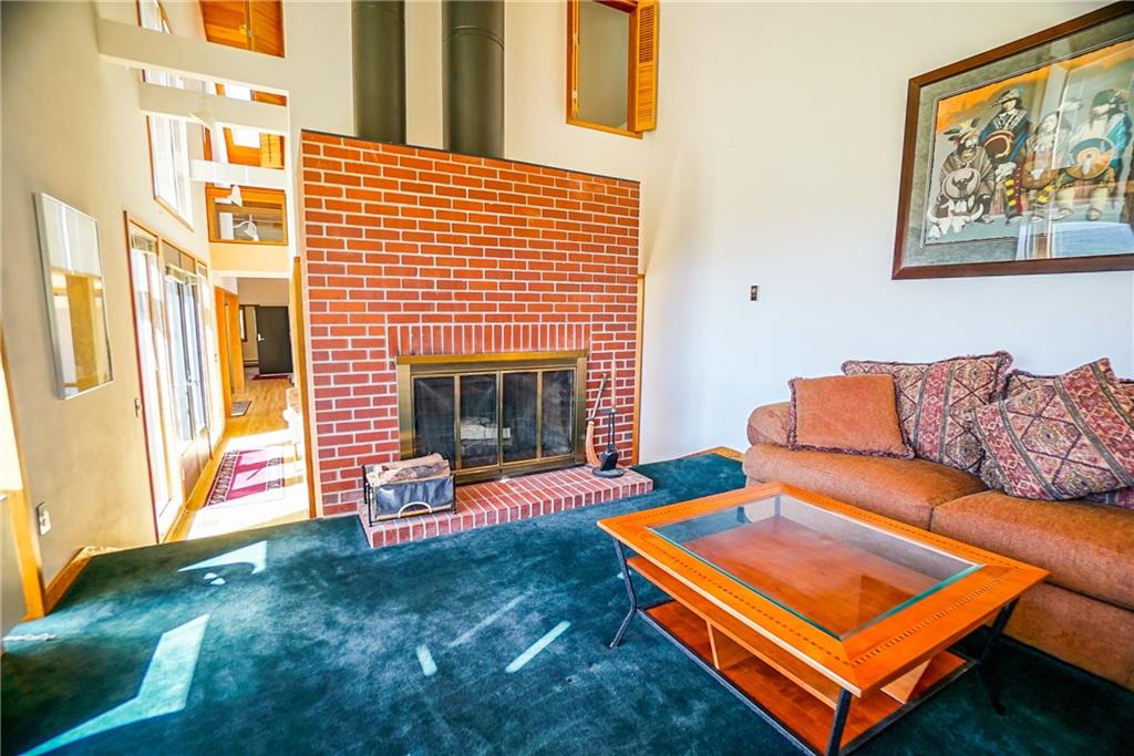 63 Saxifrage Road Keystone, CO 80435 - Photo 20 of 25 a living room with furniture and a fireplace