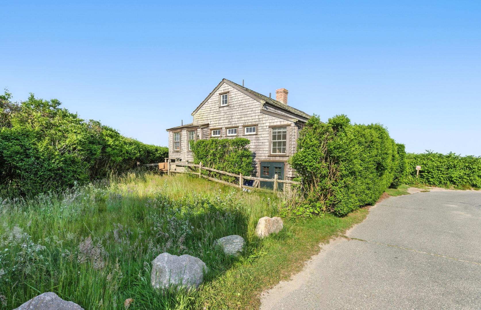 3 North Gully Road Nantucket, MA 02554 - Photo 42 of 43 a view of a house with a yard and potted plants