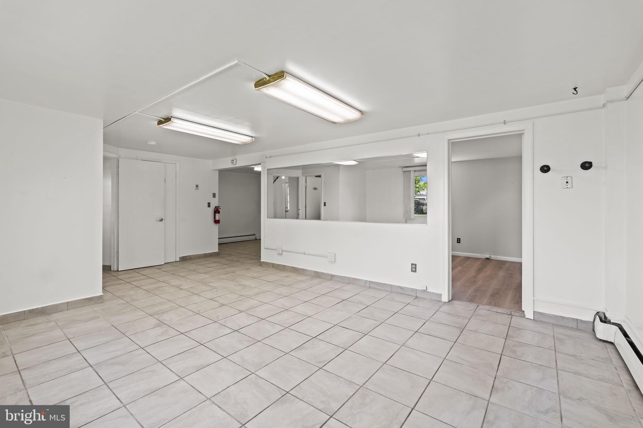 7109 Livingston Road Oxon Hill, MD 20745 - Photo 21 of 31 Basement Rec Room