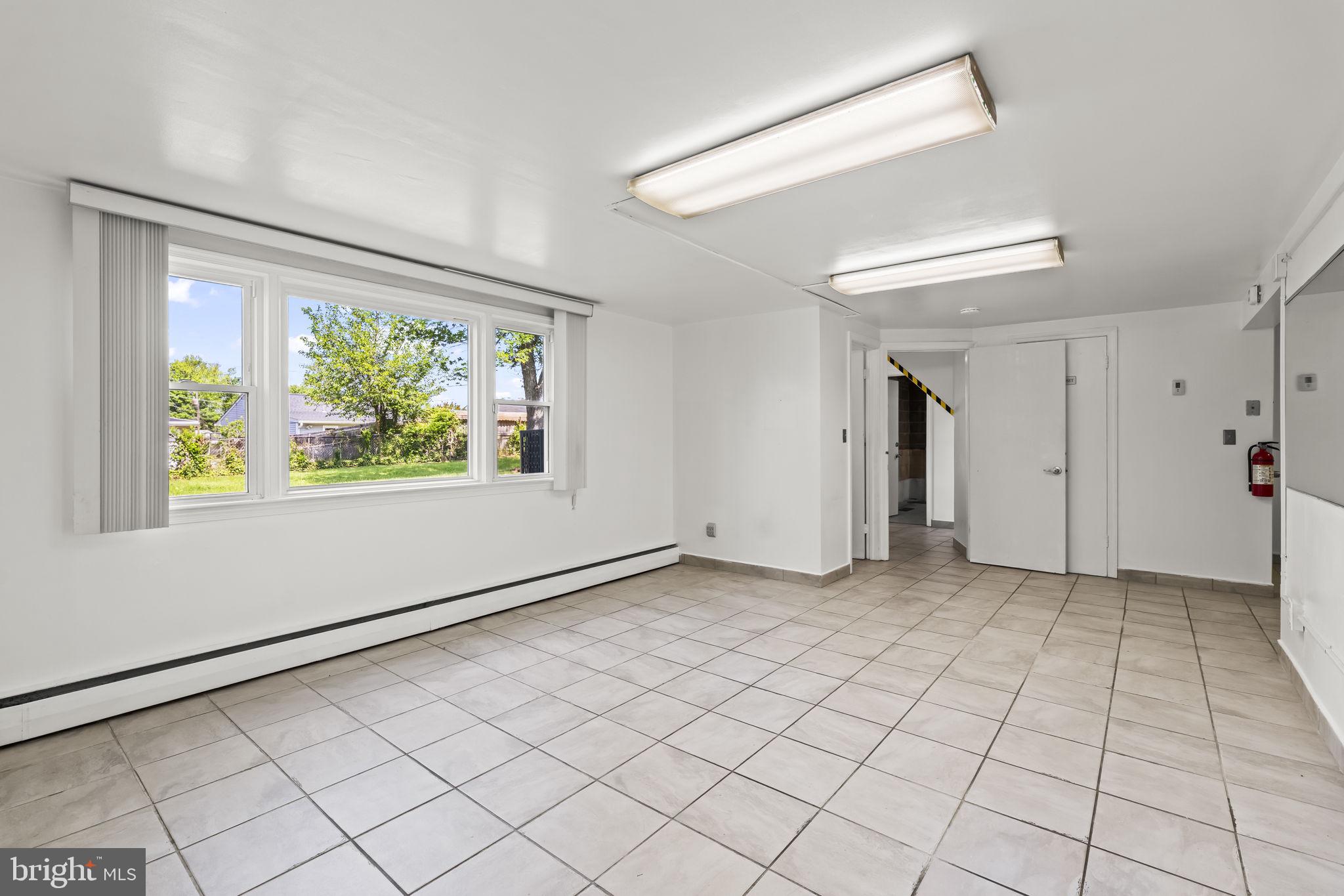 7109 Livingston Road Oxon Hill, MD 20745 - Photo 22 of 31 Basement Rec Room
