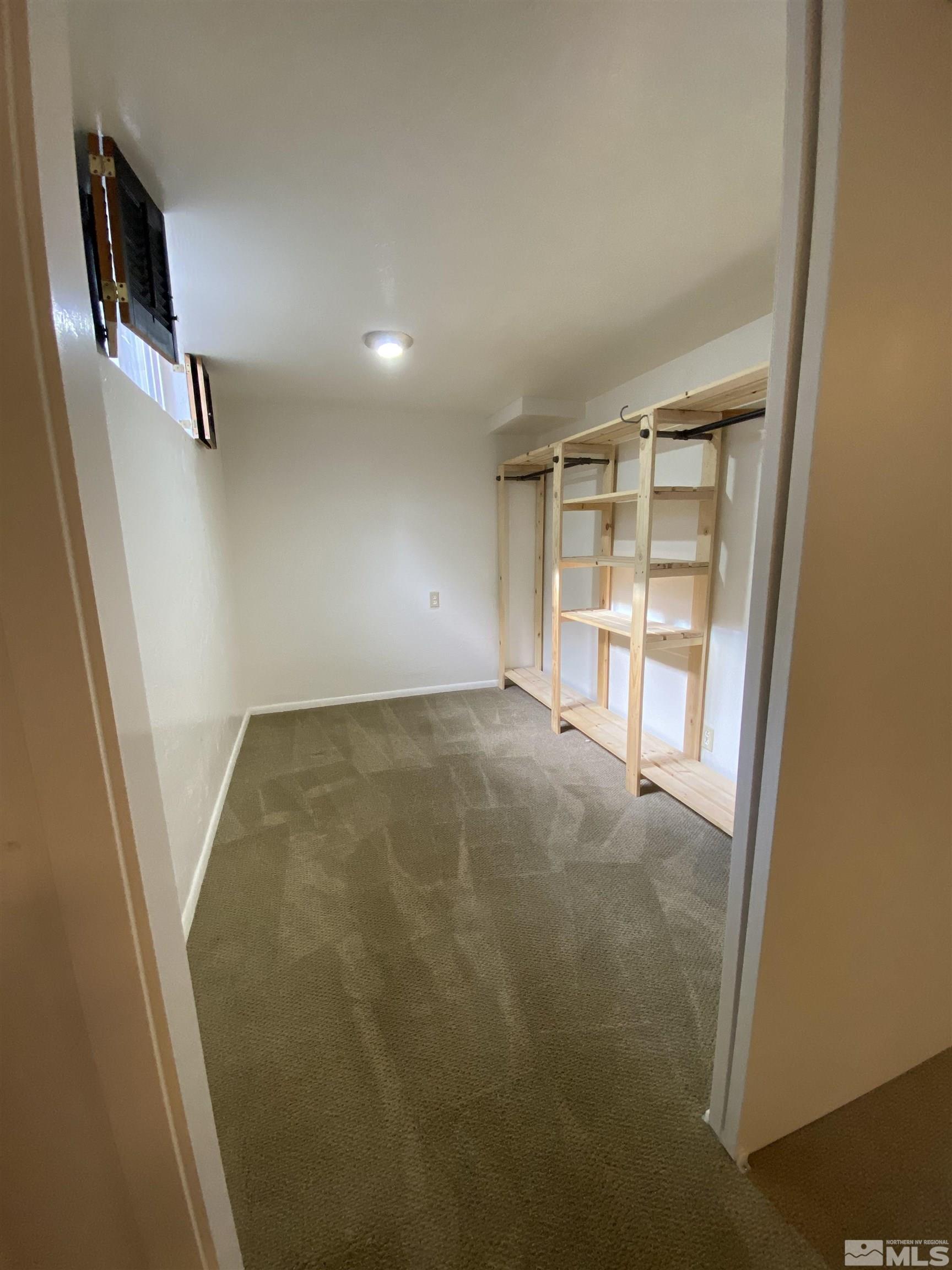 945 West 12th Street Reno, NV 89503 - Photo 13 of 29 an empty room with windows