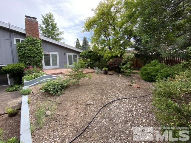 945 West 12th Street Reno, NV 89503 - Photo 21 of 29 a view of a house with a backyard