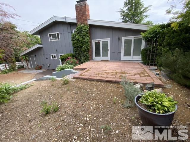 945 West 12th Street Reno, NV 89503 - Photo 23 of 29 a front view of a house with garden