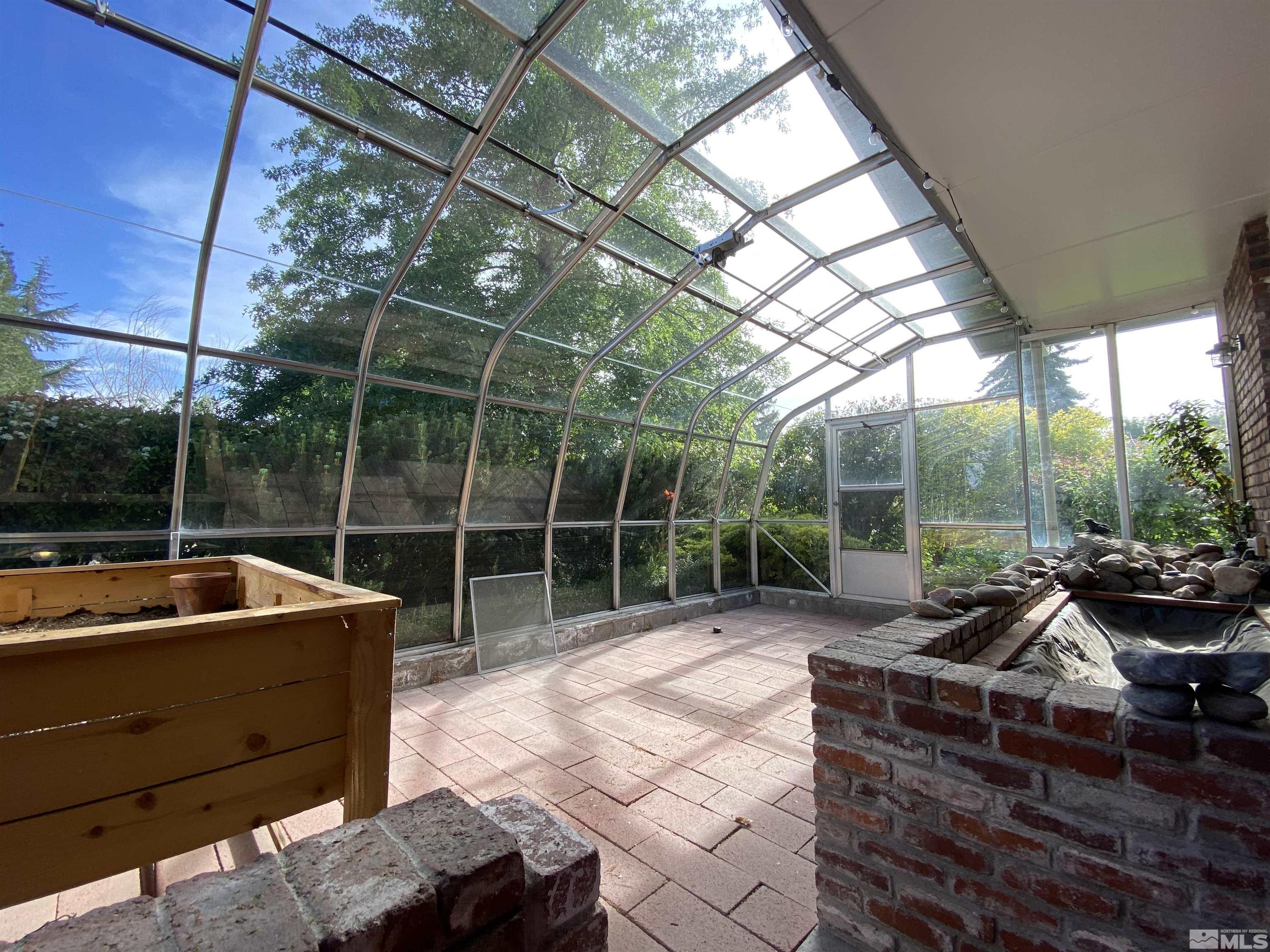 945 West 12th Street Reno, NV 89503 - Photo 5 of 29 a view of outdoor space with seating area and roof