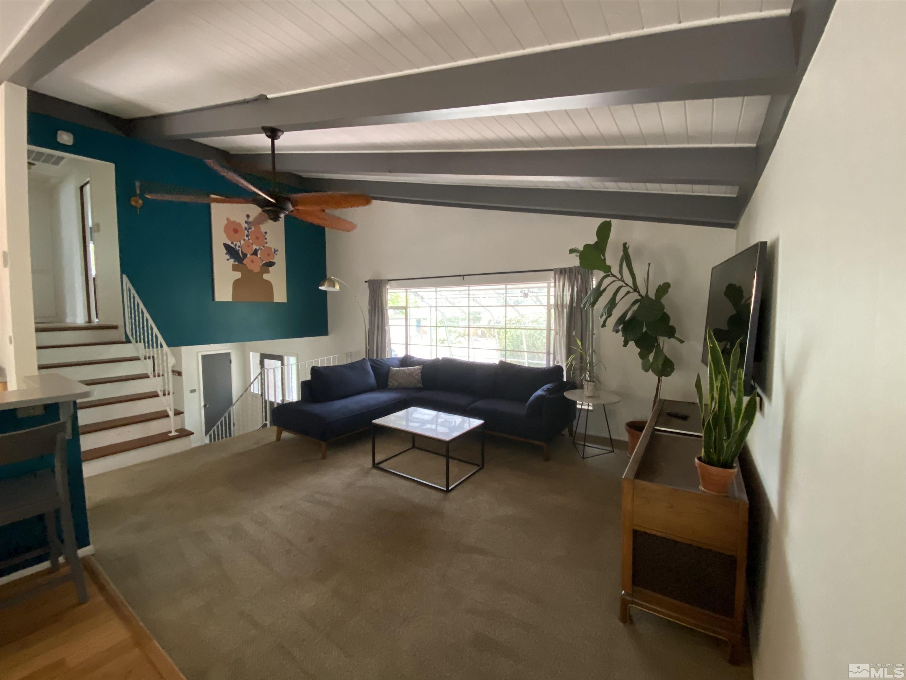945 West 12th Street Reno, NV 89503 - Photo 8 of 29 a living room with furniture and a window