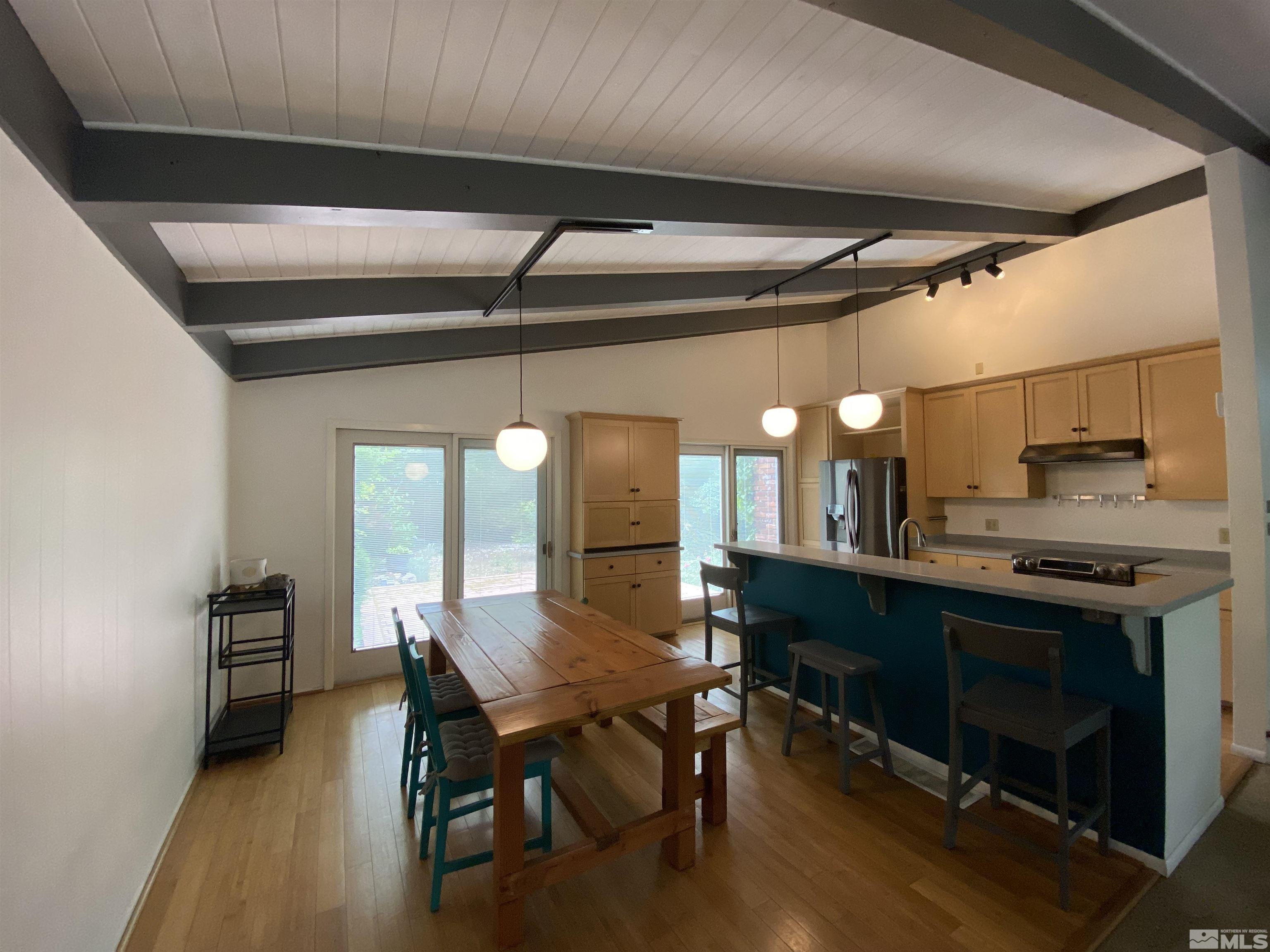 945 West 12th Street Reno, NV 89503 - Photo 9 of 29 a view of a dining room with furniture and wooden floor