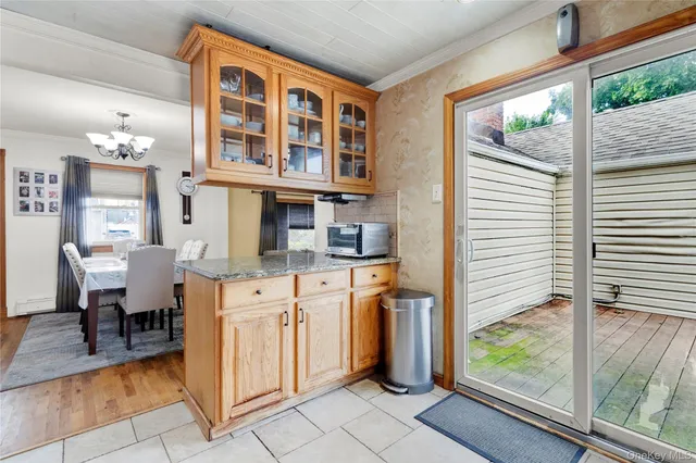 a living room with granite countertop furniture and a large window
