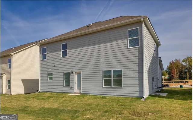 a front view of house with yard