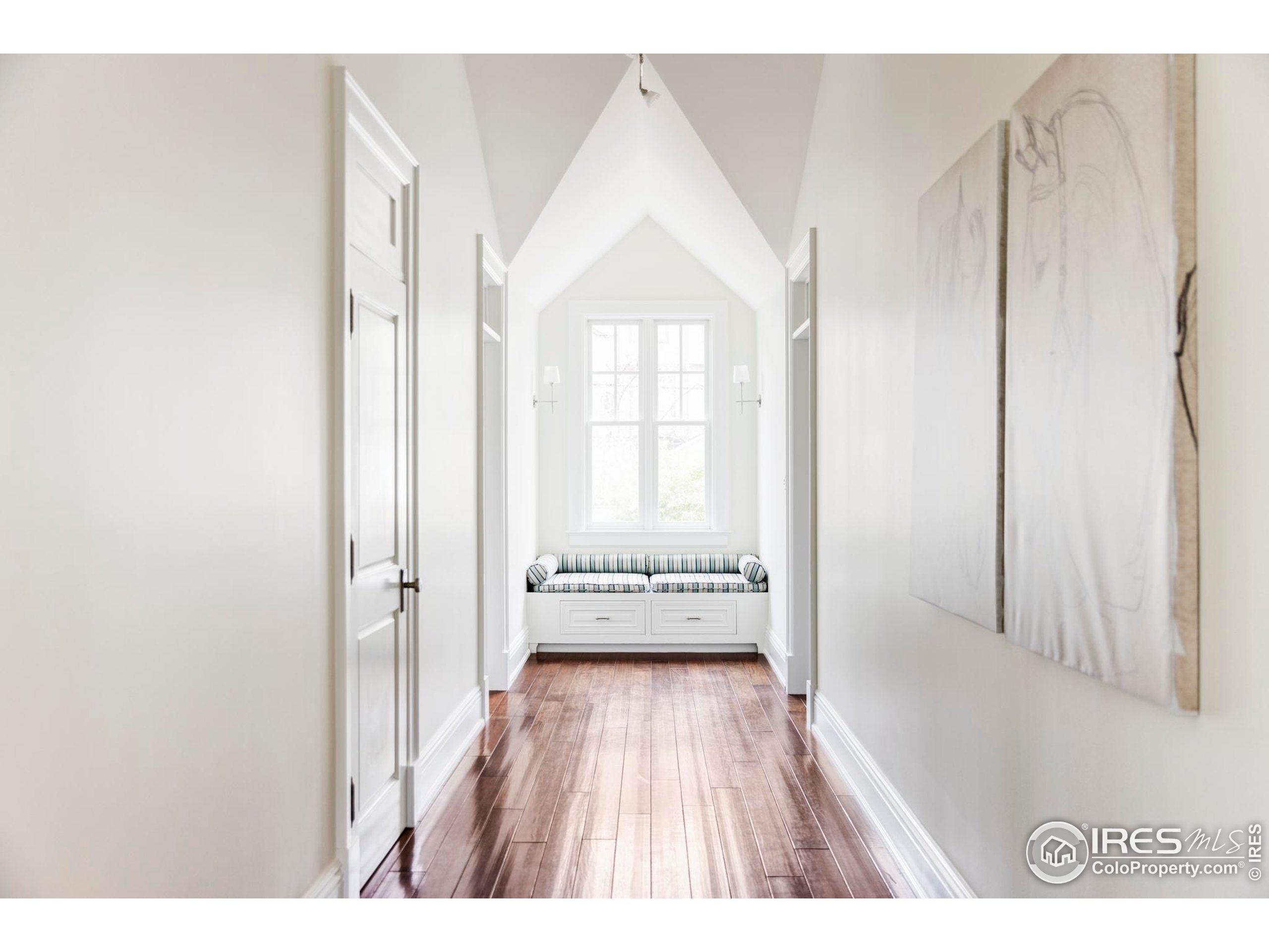 3189 5th Street Boulder, CO 80304 - Photo 13 of 37 a view of a room with wooden floor and windows
