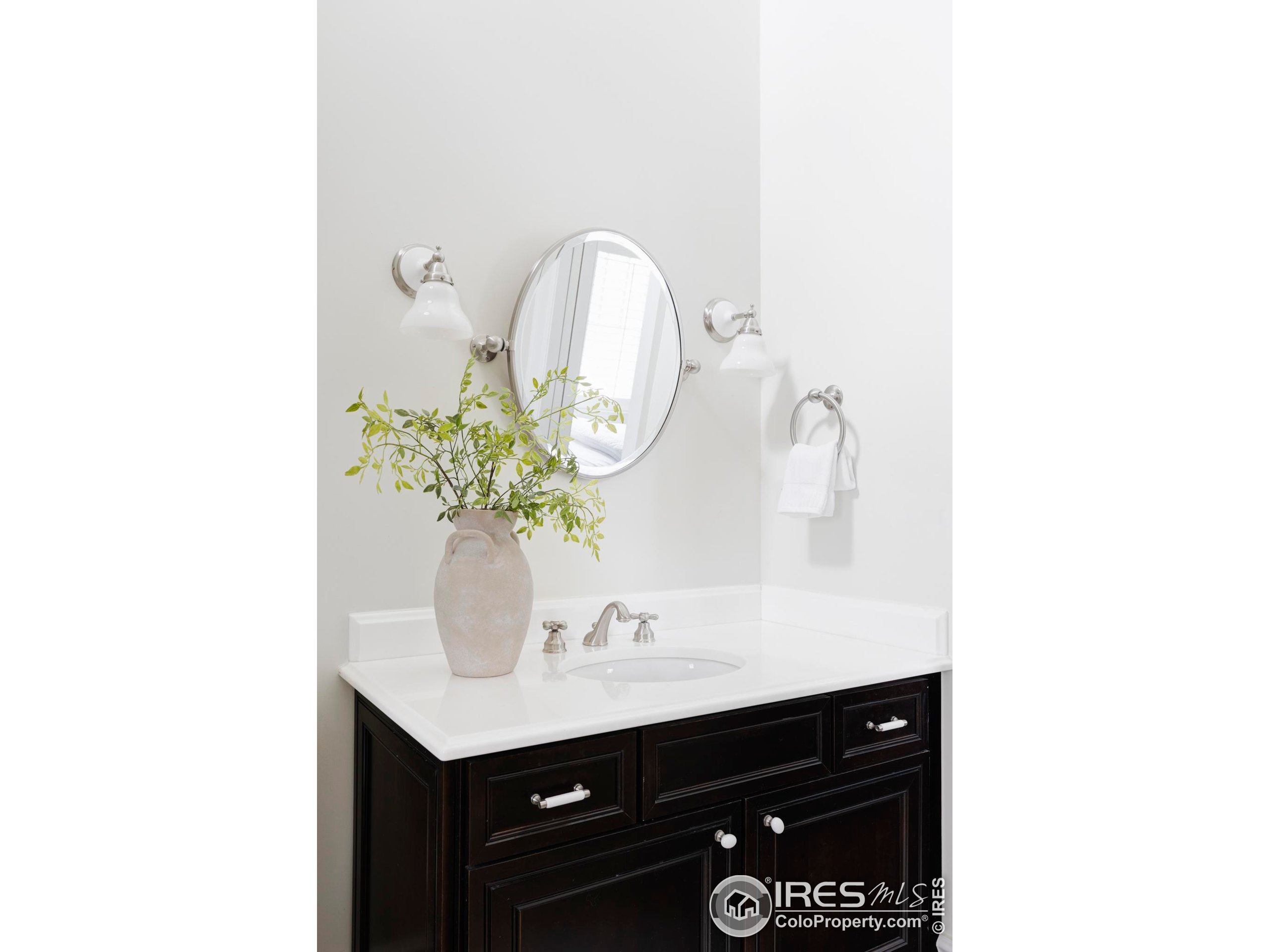 3189 5th Street Boulder, CO 80304 - Photo 20 of 37 a bathroom with a sink and a mirror