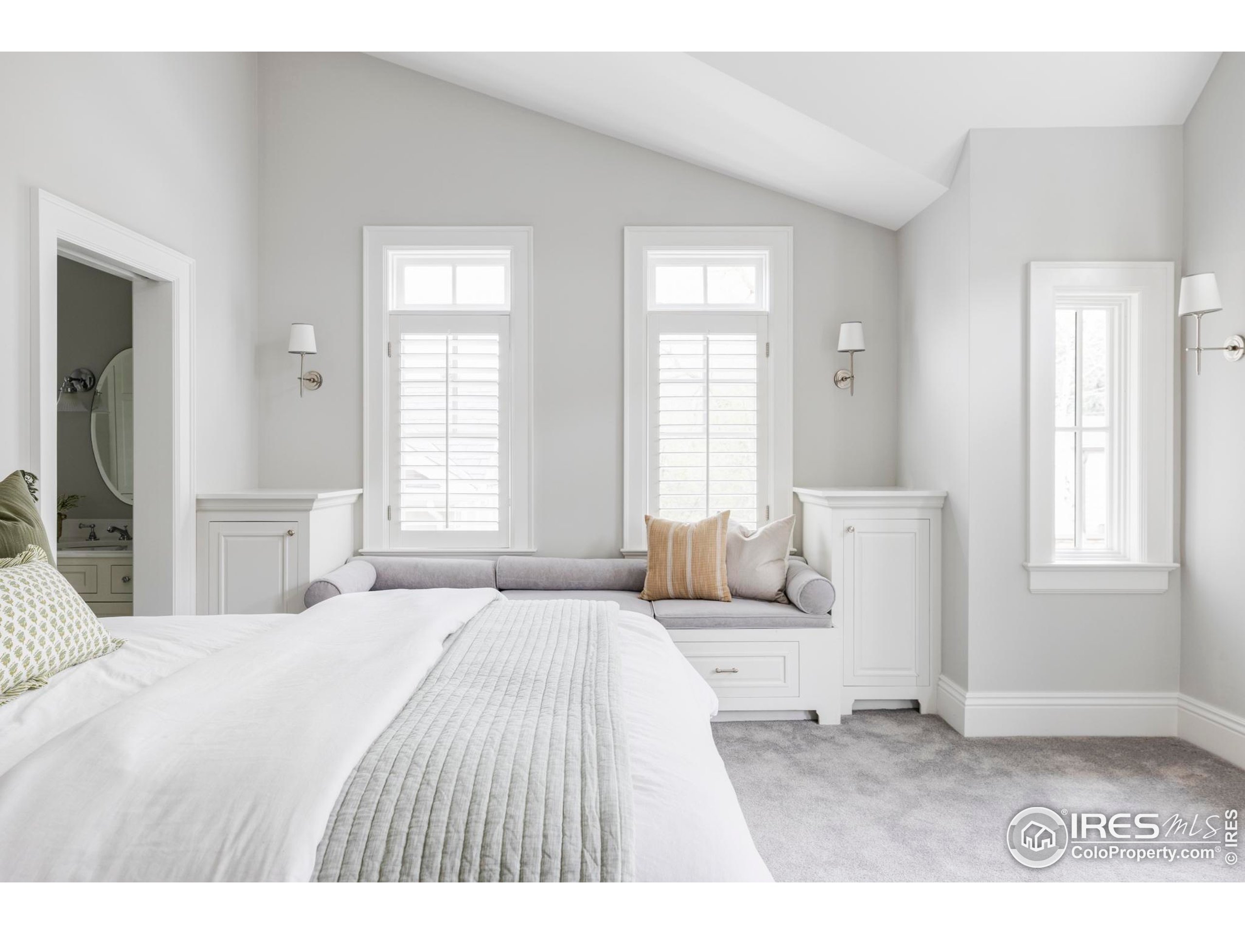 3189 5th Street Boulder, CO 80304 - Photo 24 of 37 a bedroom with a large bed and a window