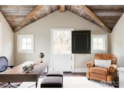 a workspace with furniture and window