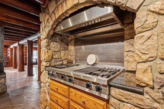 a bedroom with a large bed and a large window