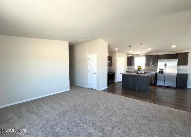 a view of a kitchen with a sink
