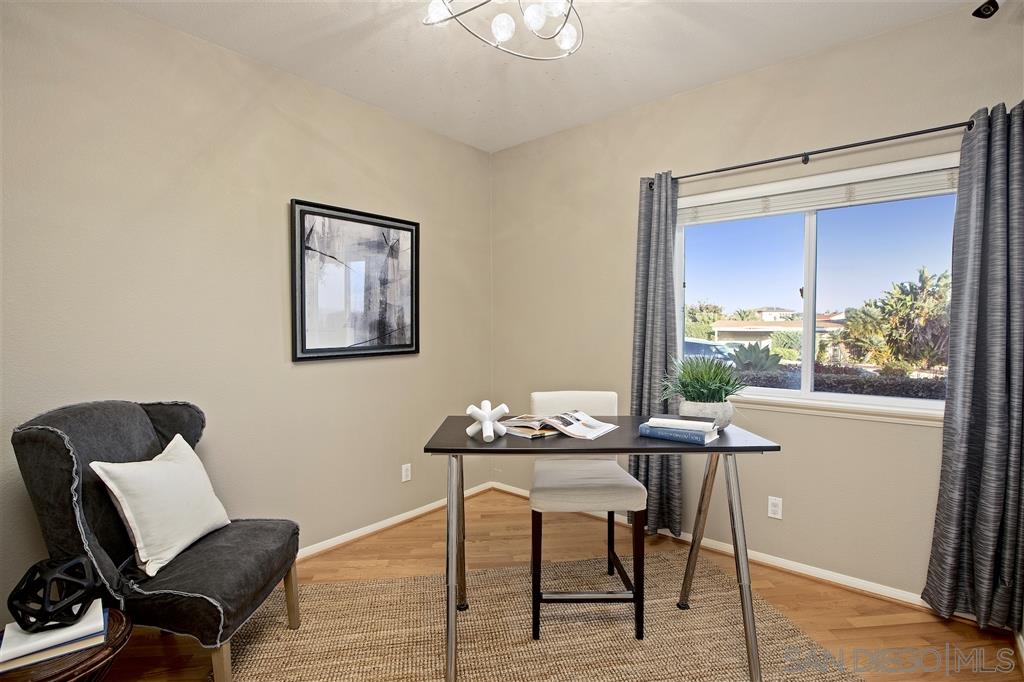 5466 Soledad Road La Jolla, CA 92037 - Photo 12 of 18 a dining room with furniture and window