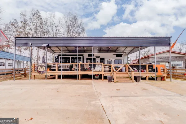a view of a garage with chairs
