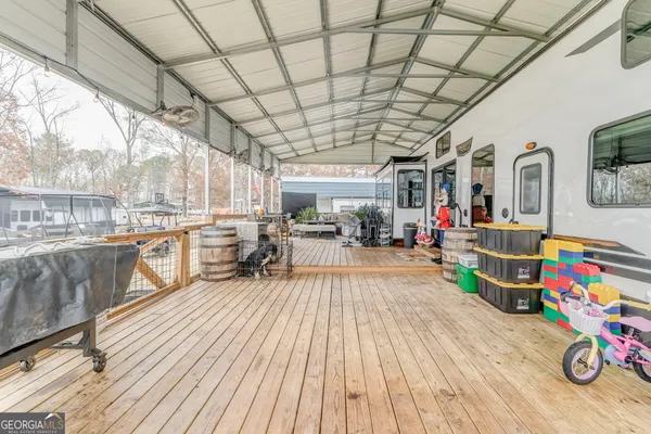 a view of a chairs and table in a patio
