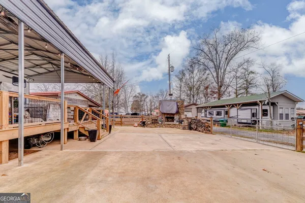 a view of a terrace with sitting area