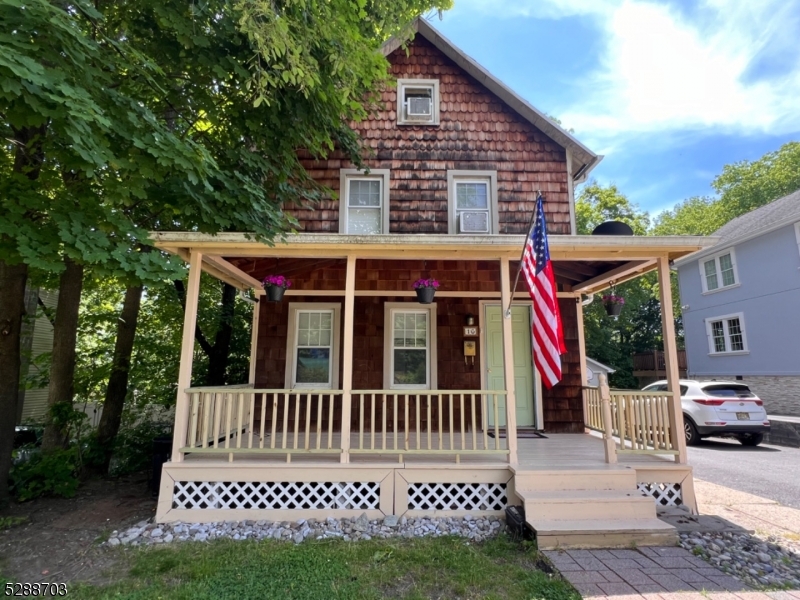a view of a house with a porch