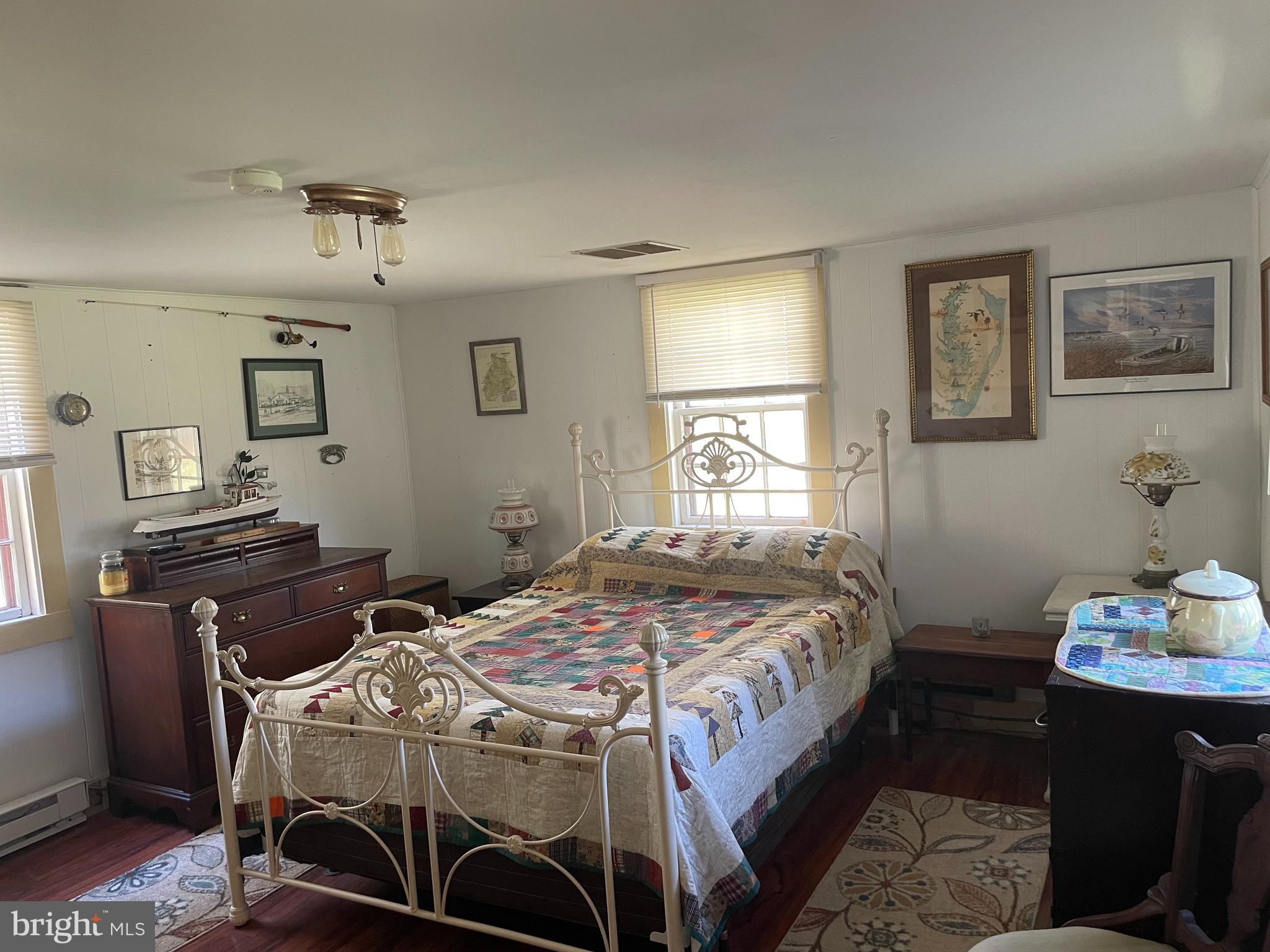 2720 Church Street Quantico, MD 21856 - Photo 12 of 35 a bedroom that has a bed and a table in it